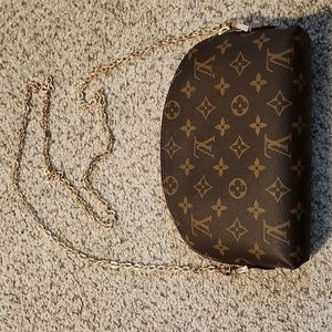 Louis vuitton makeup pouch GM with chain
